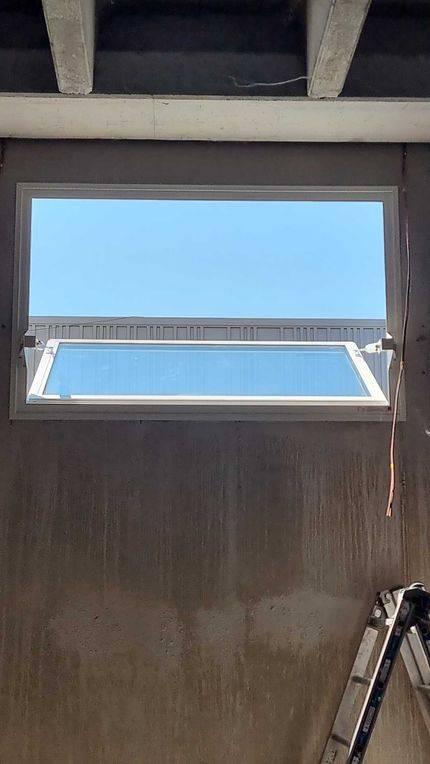 Pose d'un lanterneau relié à un asservissement