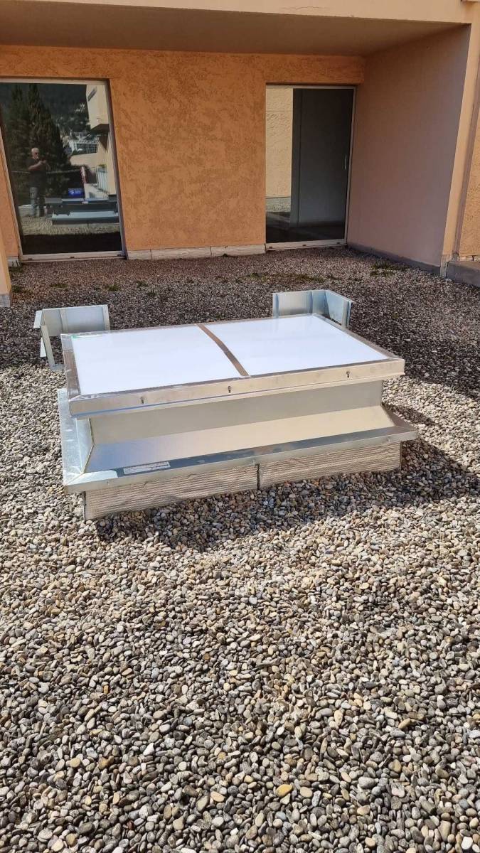 Mise en place d'un lanterneau dans un Intermarché contact